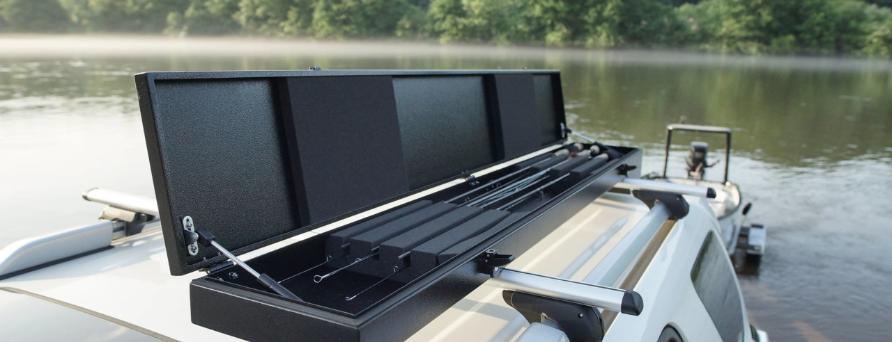 Open Toccoa Rod Box mounted on a vehicle by a river